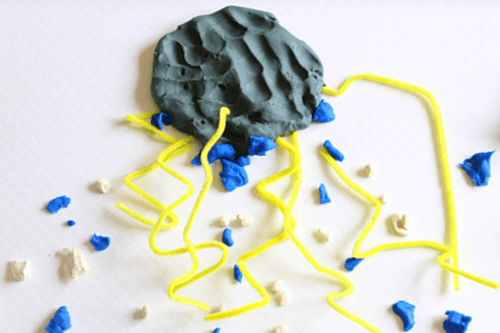 Playdough rain cloud with pipe cleaner lightning. 