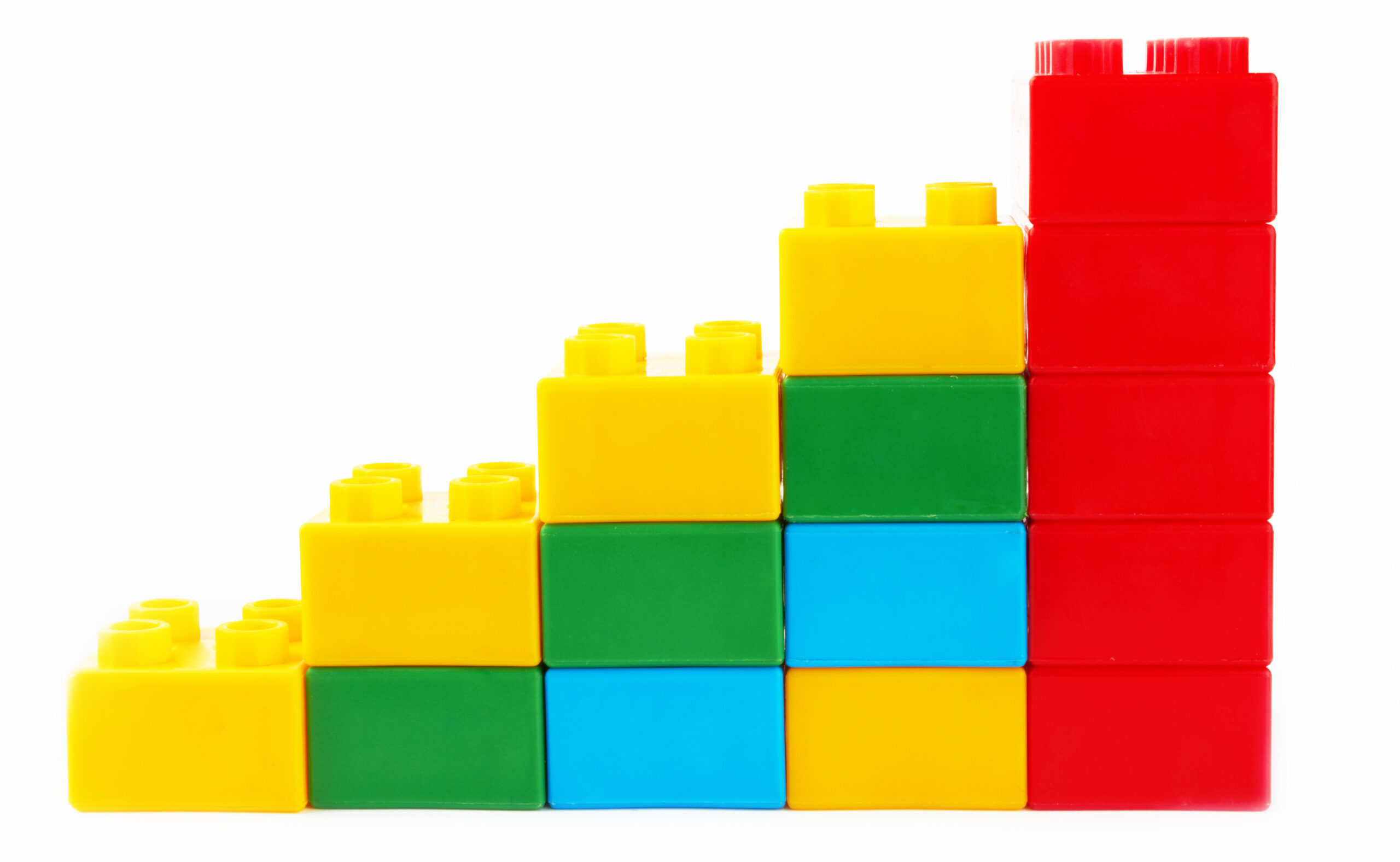 A stack of colorful duplo blocks. 