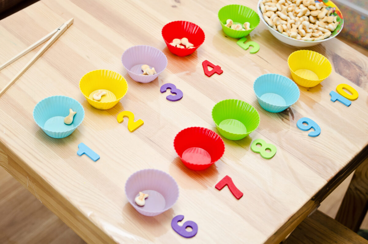 Numbers and cup cake holders used for a fun snack counting game. 