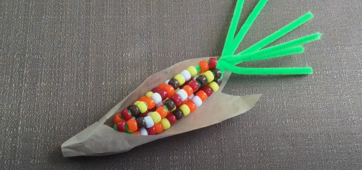 A finished corn on the cob bead and pipe cleaner fun craft for kids. 