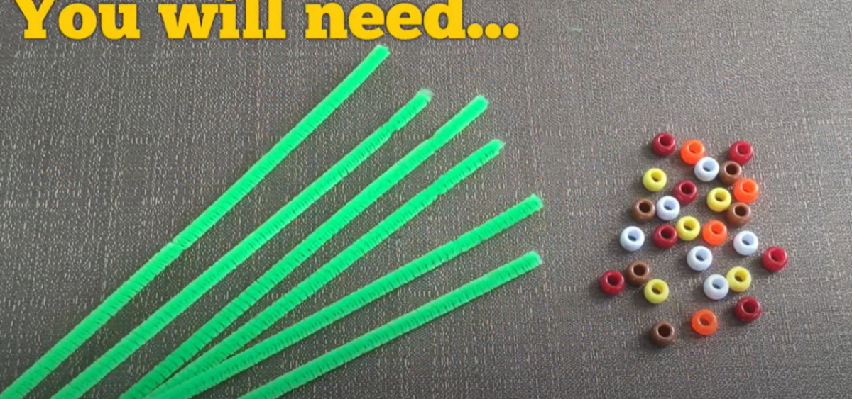 Pipe cleaners and beads laid out on the table ready for a fun thanksgiving craft. 