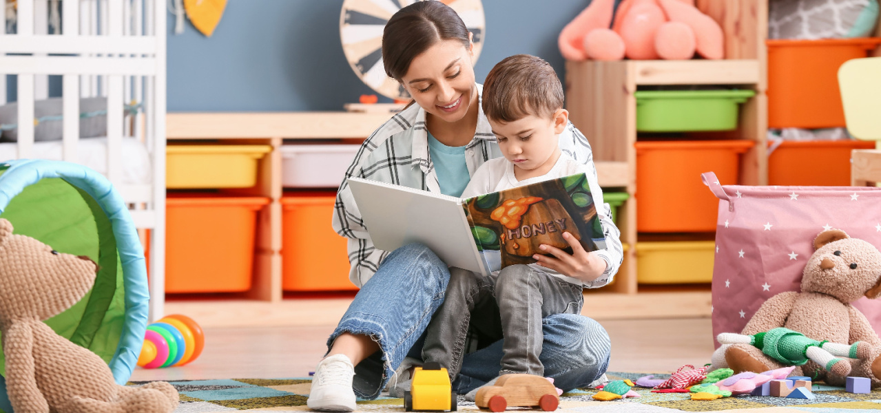 Mother reading to her young preschool son. 