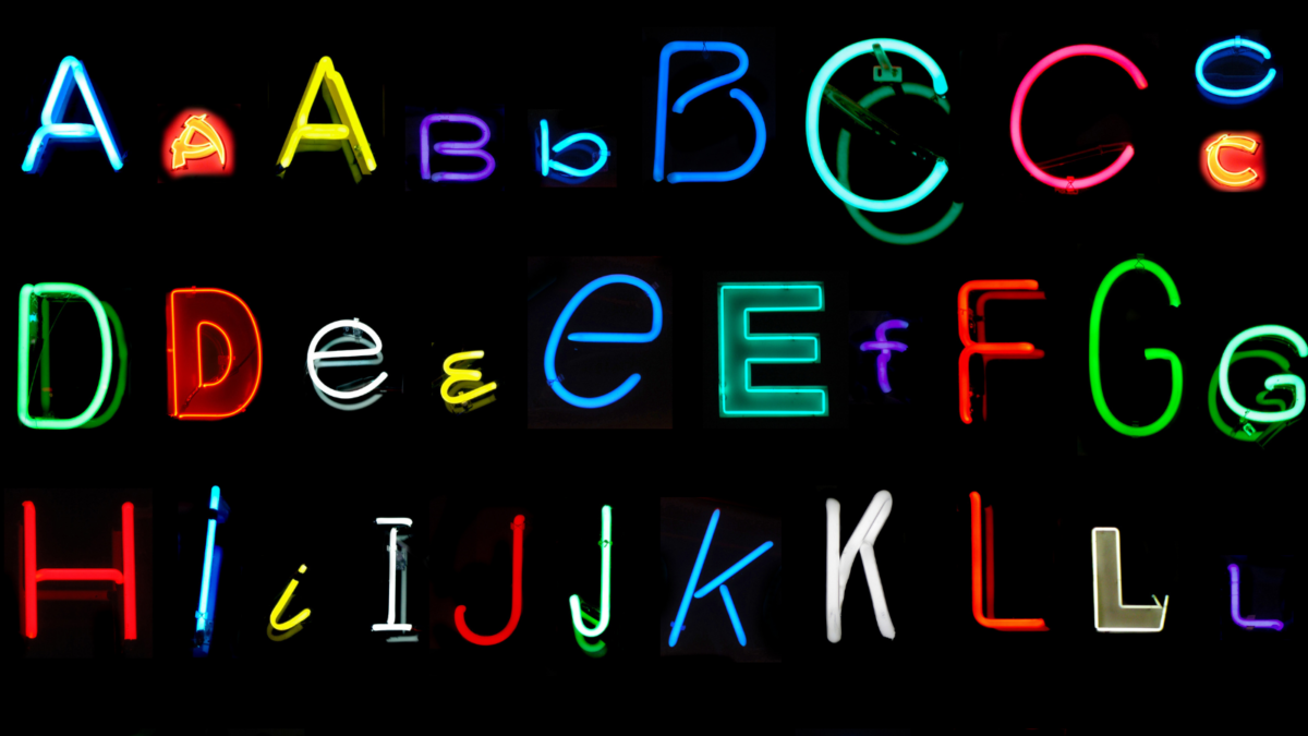 Alphabet letters on a neon sign. 