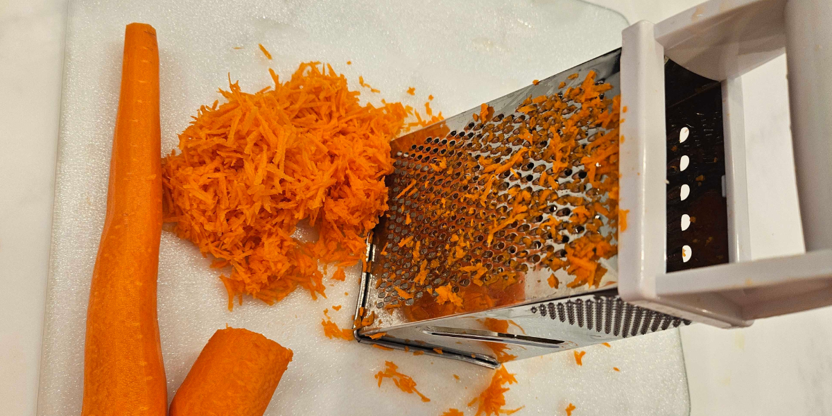 Grated carrots used to cover the cheese ball snack. 