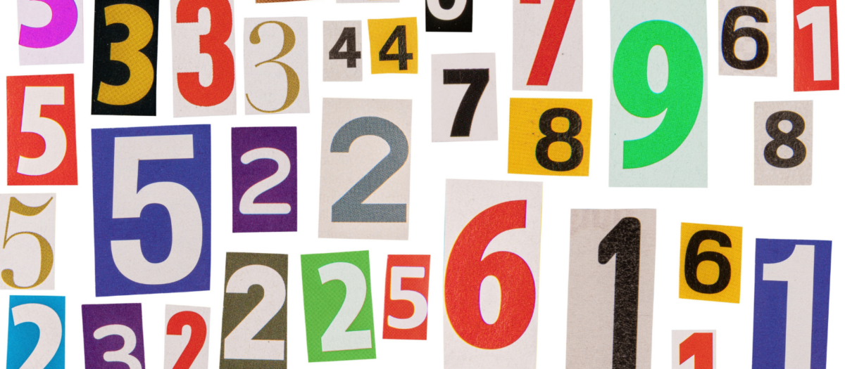 A collection of numbers cut from a magazine. 