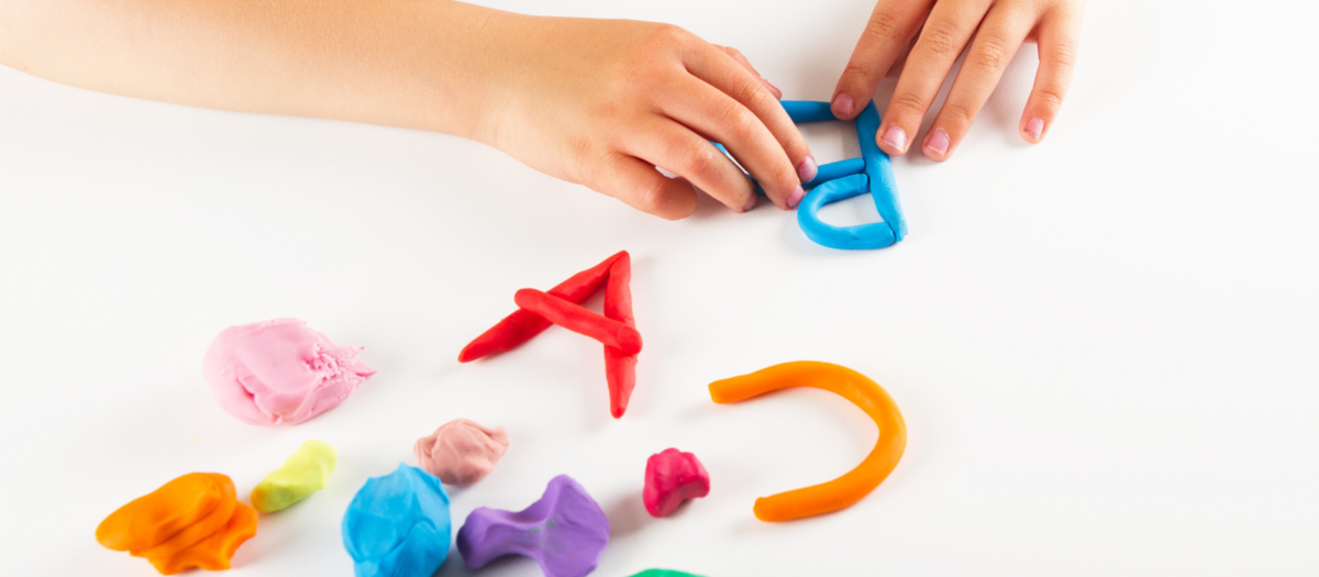 Colorful playdough letters. 