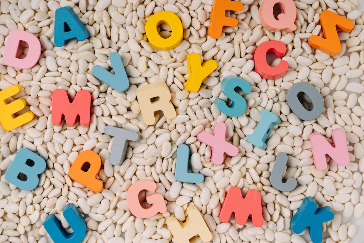 An alphabet sensory bin with colorful letters. 