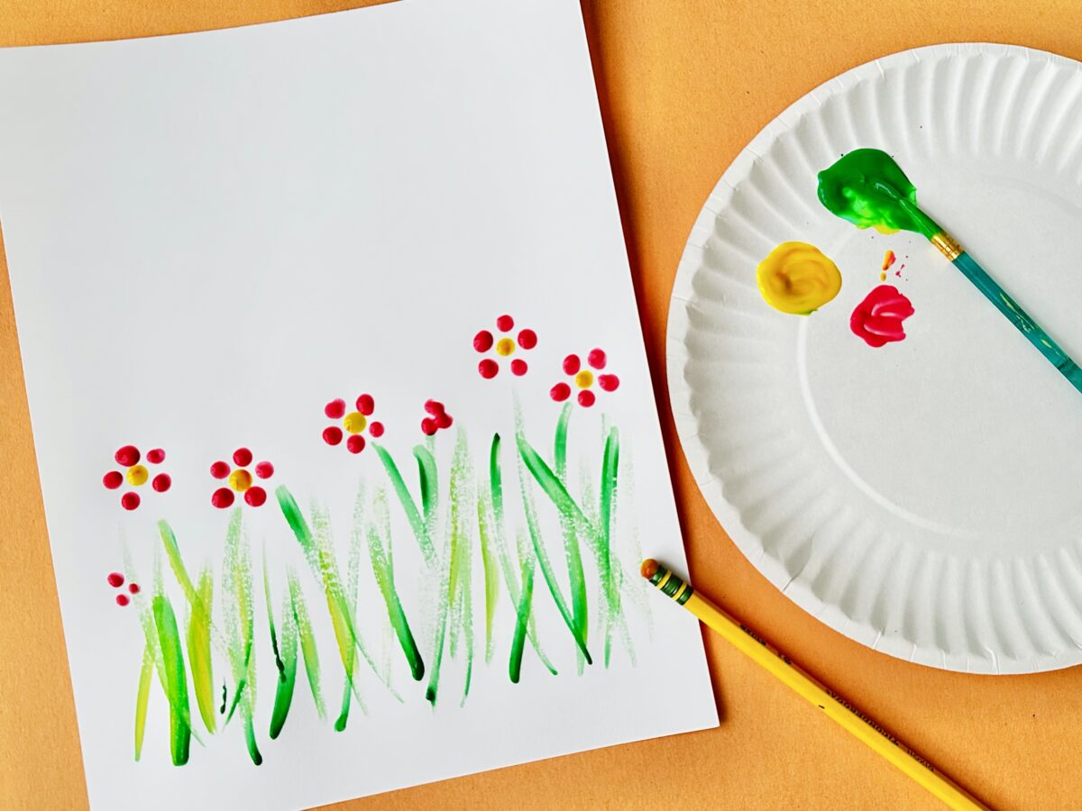 A painted garden on a white paper using a pencil eraser. Letter g craft from ABCmouse.com. 