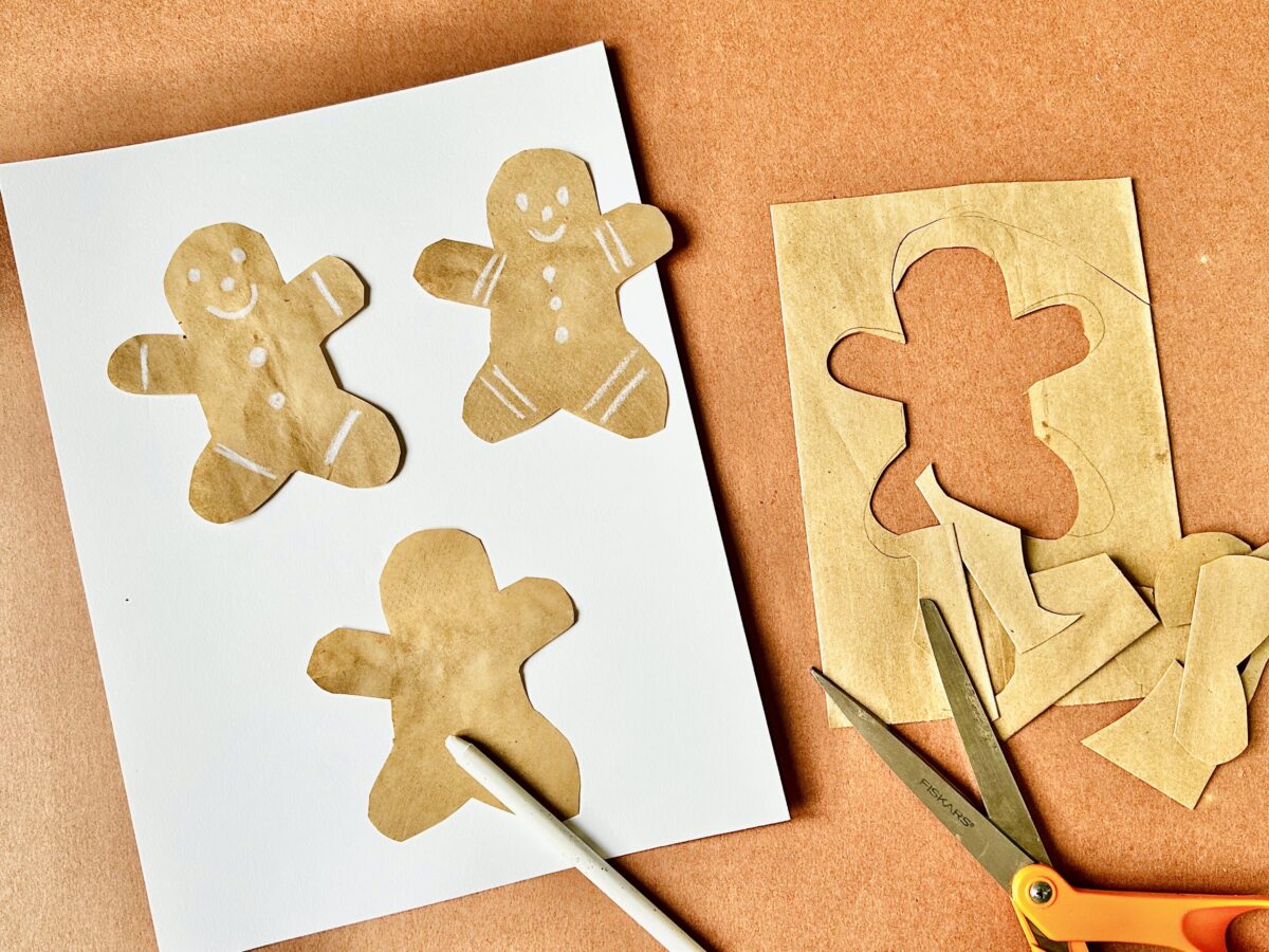 Letter g craft from ABCmouse.com. gingerbread men cut out from brown paper laid on a white background.  