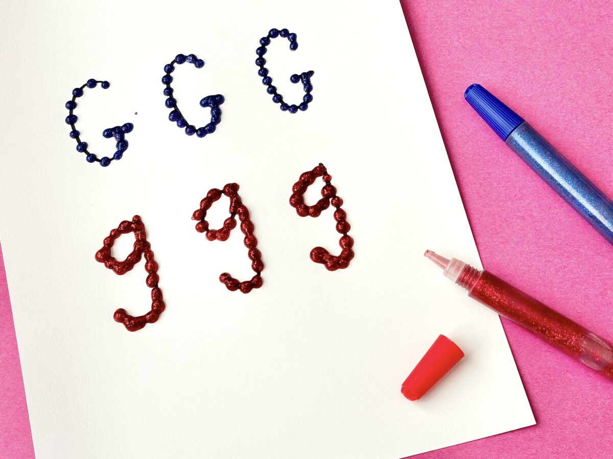 Glitter glue used to create upper and lowercase letter g's. Letter g craft from ABCmouse.com.