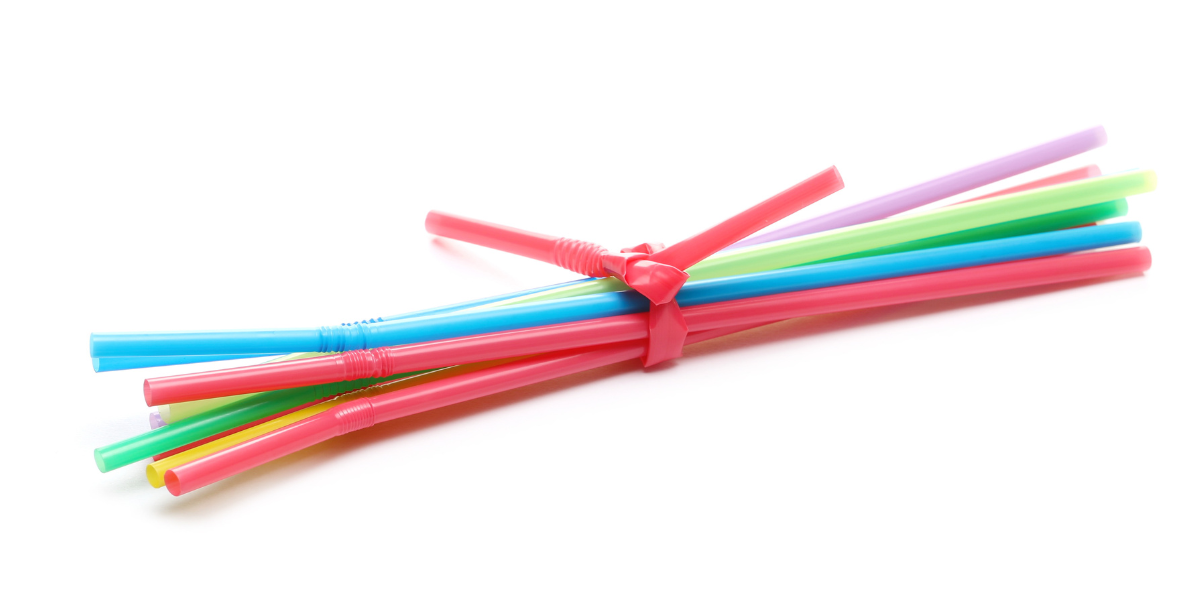 A bundle of colorful straws tied together with another straw. 