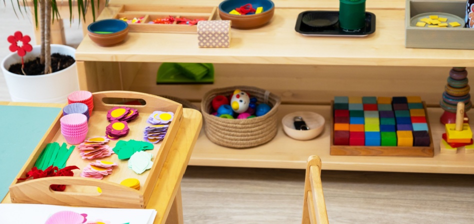 Colorful hands on toys organized nicely on shelves. 