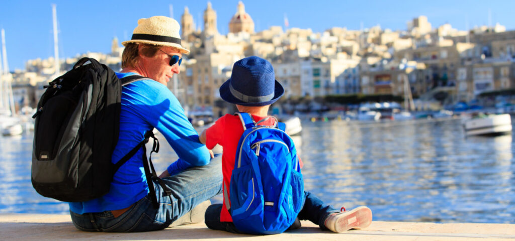 A father and his son traveling to learn about the world. 