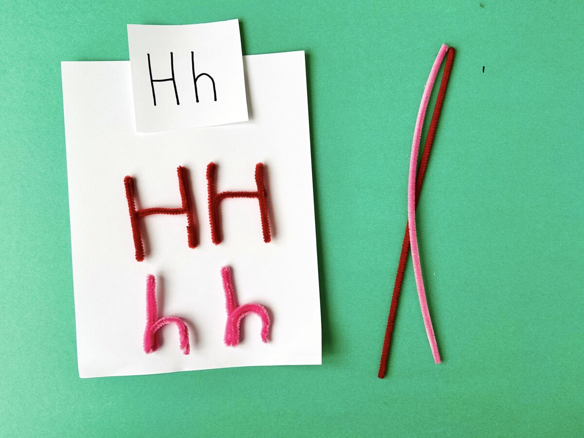 A large letter H and a small letter h made with pipe cleaners. Fun letter craft to help kids learn the alphabet. 