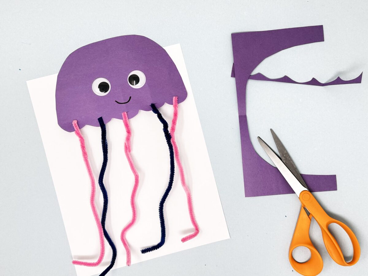 A cute purple jellyfish made from construction paper with pip cleaner tentacles. 