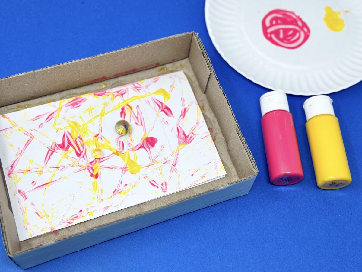 Marble painting in a box activity. 