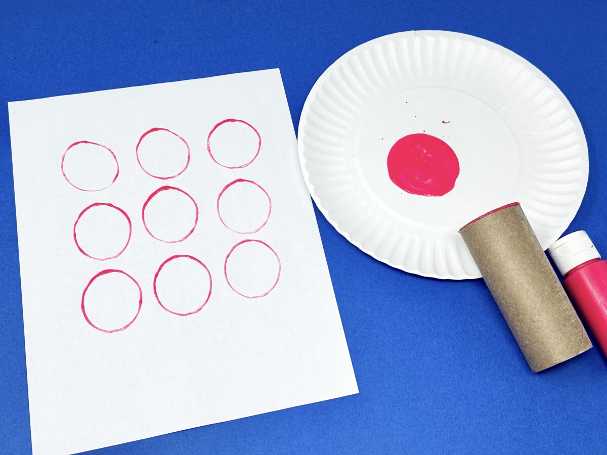 Letter O stamping craft for kids with toilet paper rolls and paint. 