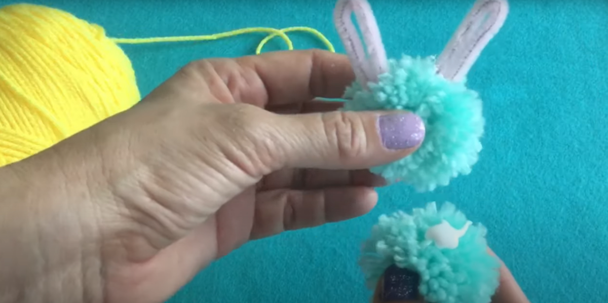 Assembling the pom-pom bunny. 